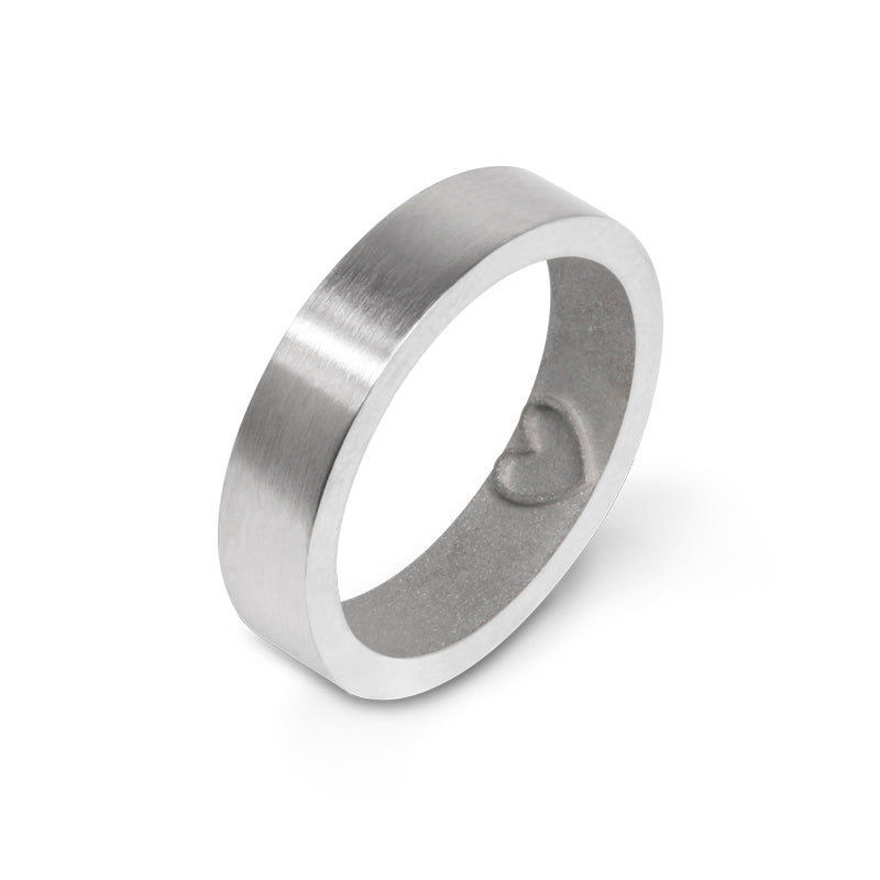Inner Message ring with a heart embossed on the inside, leaving a heart-shaped impression on the finger when worn